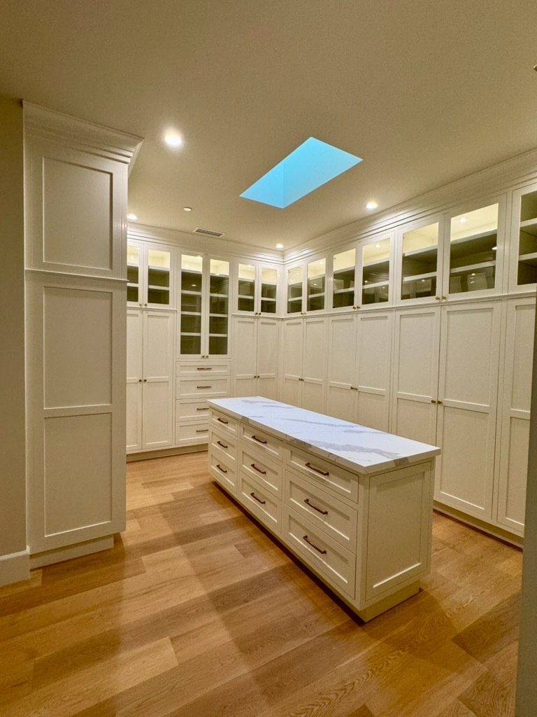 White dressing room built-ins after repaint